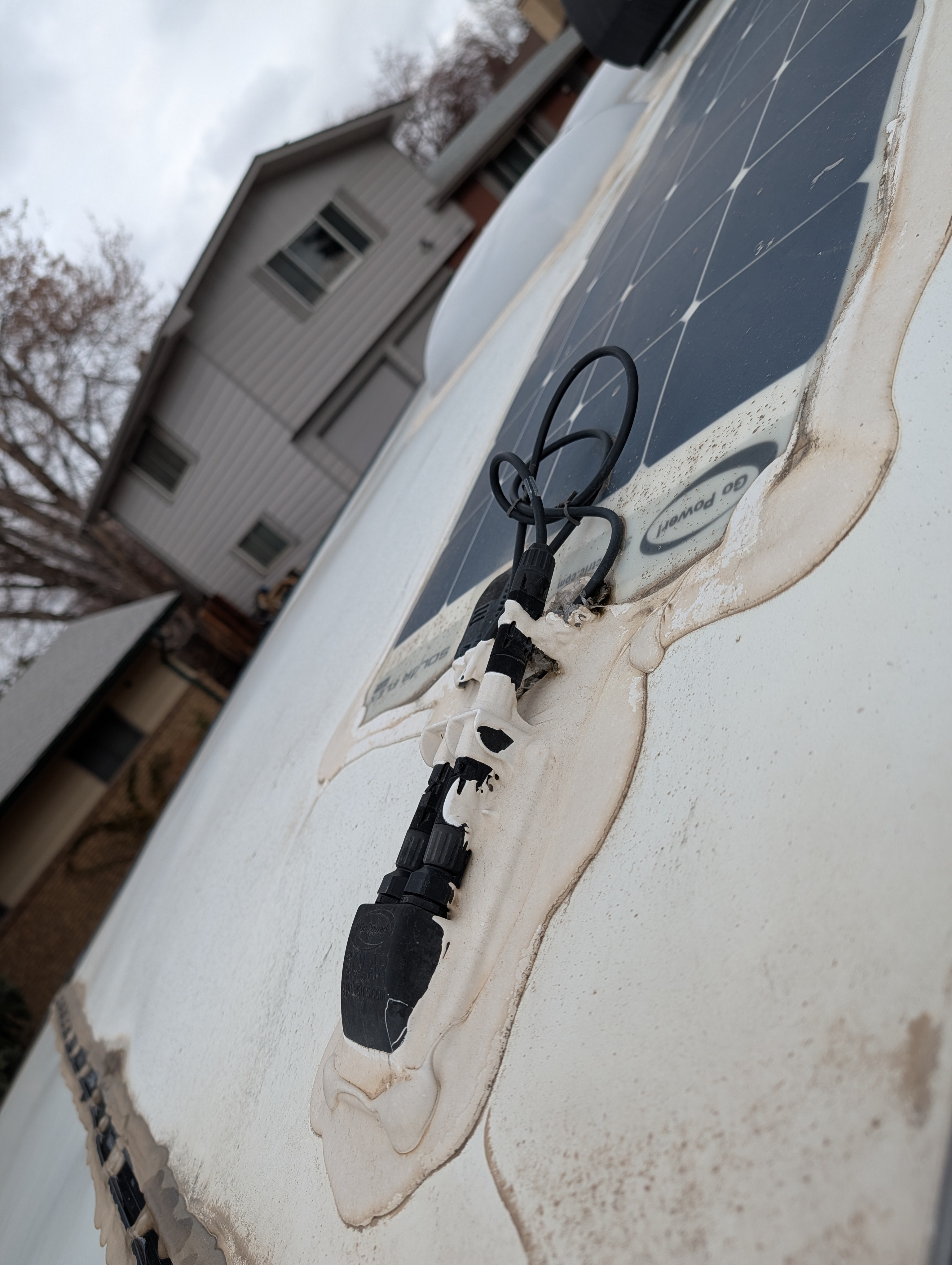 Roof seam near a solar panel